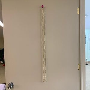 Extremely long beaded necklace